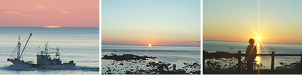 日の出時の岬の写真